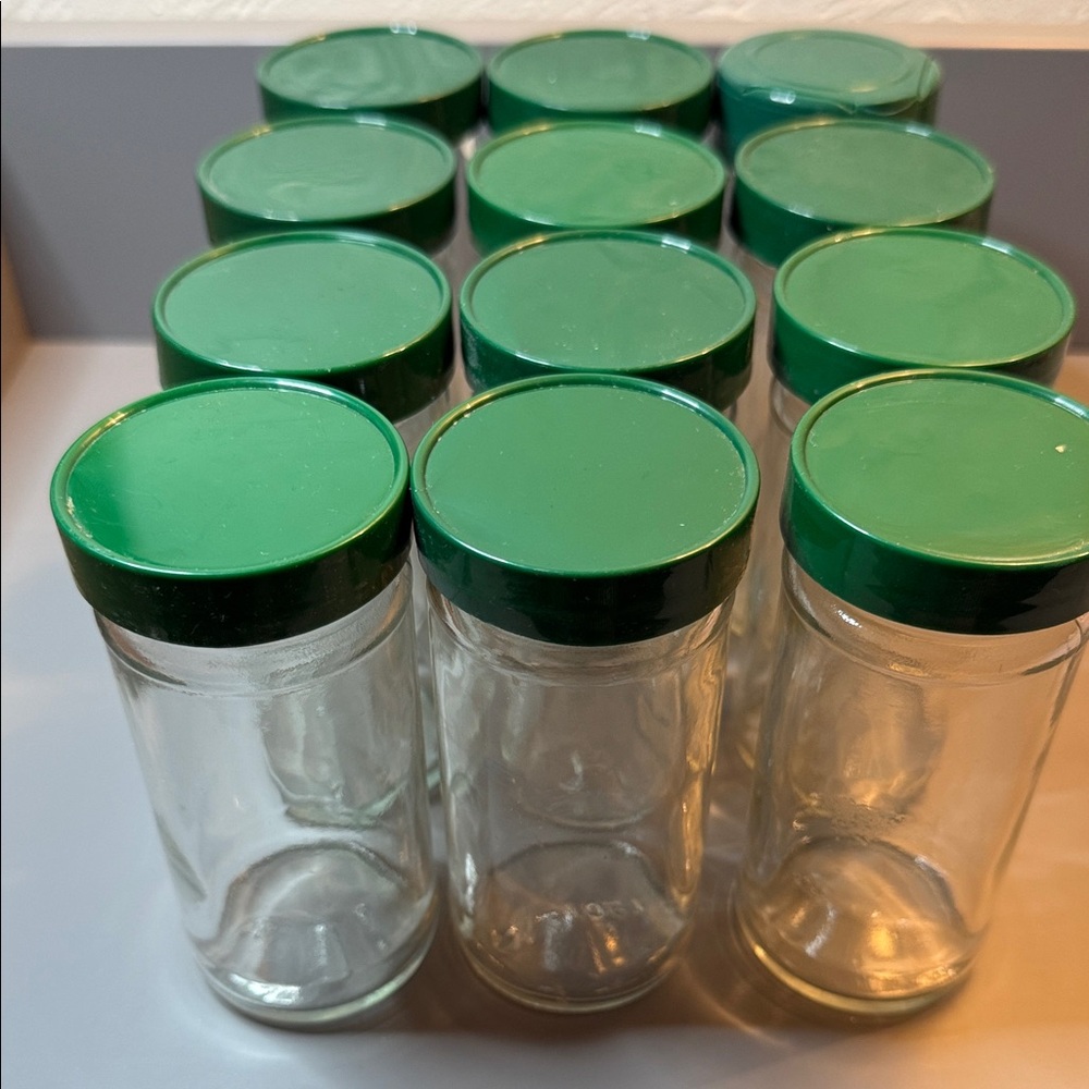 Set of 12 Vintage Glass Round Spice Jars W/ Green Lids, Approximately 4.5” Tall - Picture 1 of 8